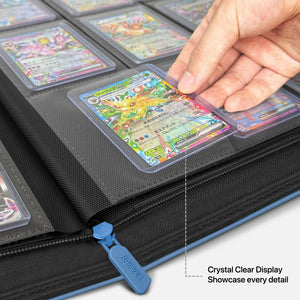 Hand placing a toploadered Pokemon card into a crystal-clear pocket on an open blue toploader binder