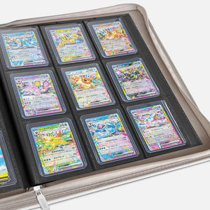 Open white Pokemon toploader binder showing 9-pocket pages filled with holographic trading cards