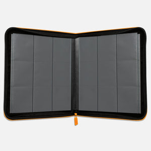 Interior view of an orange Pokemon toploader binder with empty 9-pocket pages and 252-toploader capacity