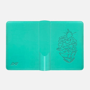 Green Pokemon card binder laid open showing the embossed Venusaur inner cover