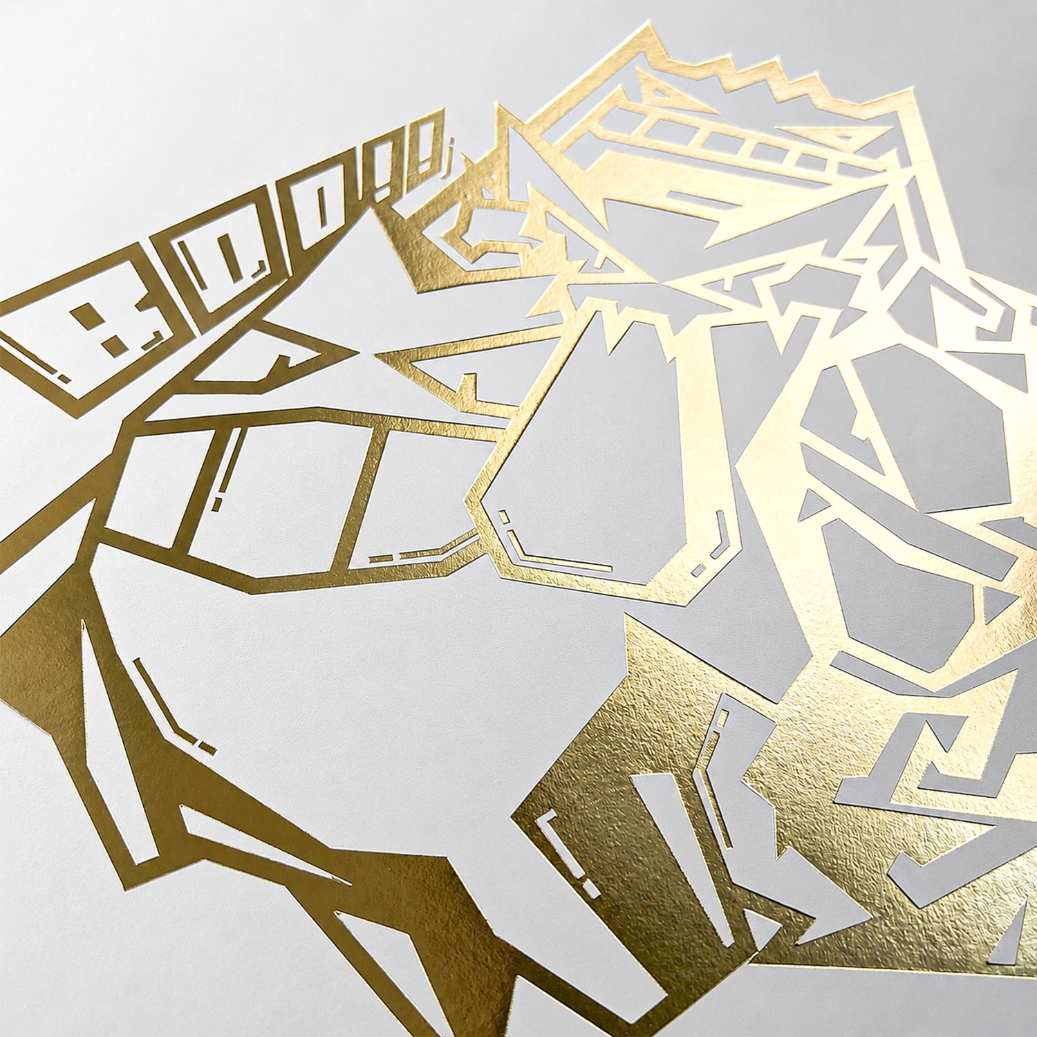 Close-up of the gold foil Gengar design pressed into white leather on a Pokemon toploader binder