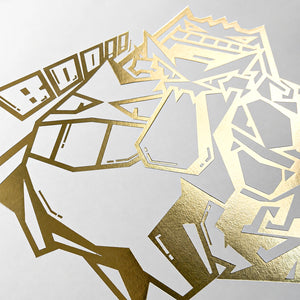 Close-up of the gold foil Gengar design pressed into white leather on a Pokemon toploader binder