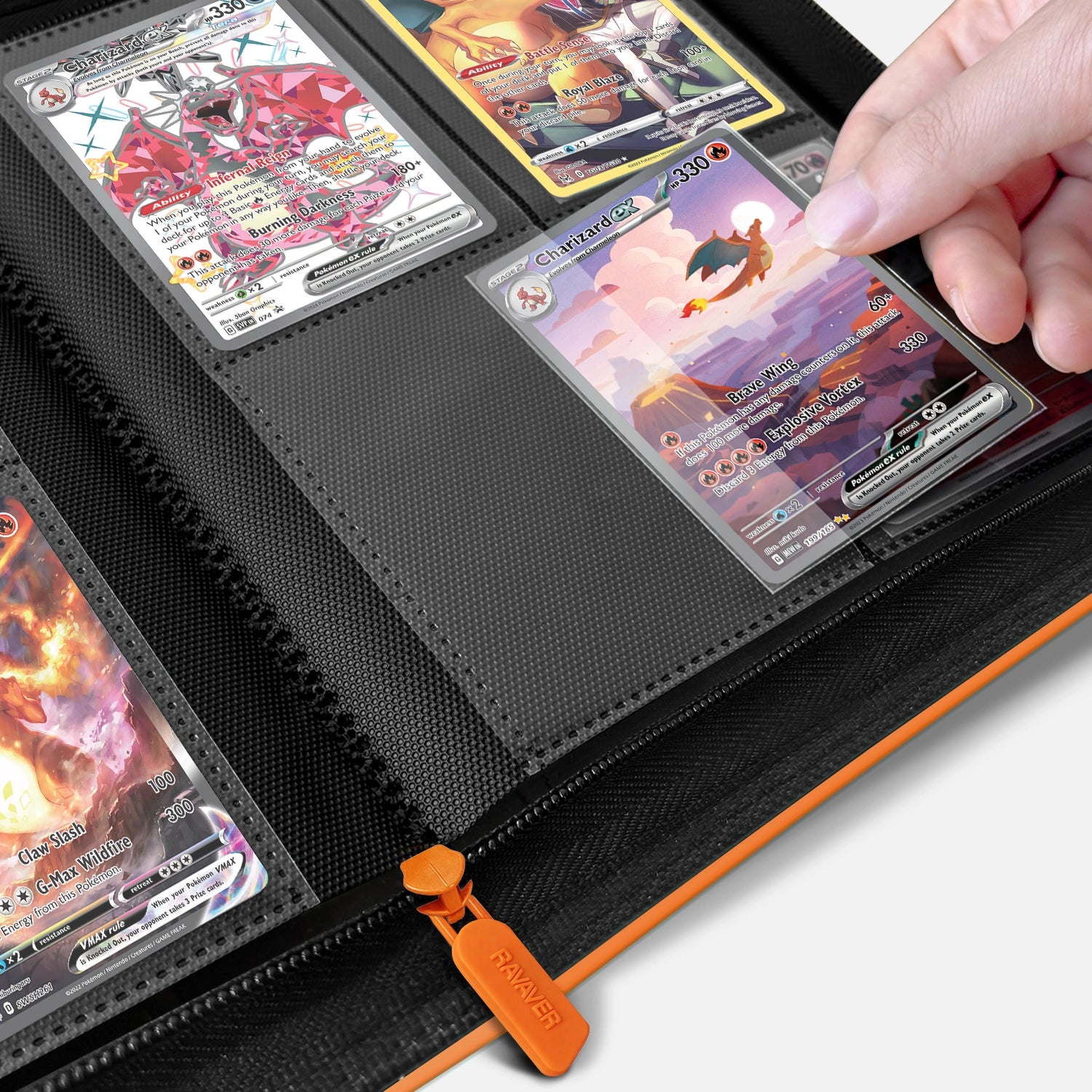 Hand placing a holographic Charizard card into a crystal-clear pocket on an open orange 4-pocket Pokemon card binder