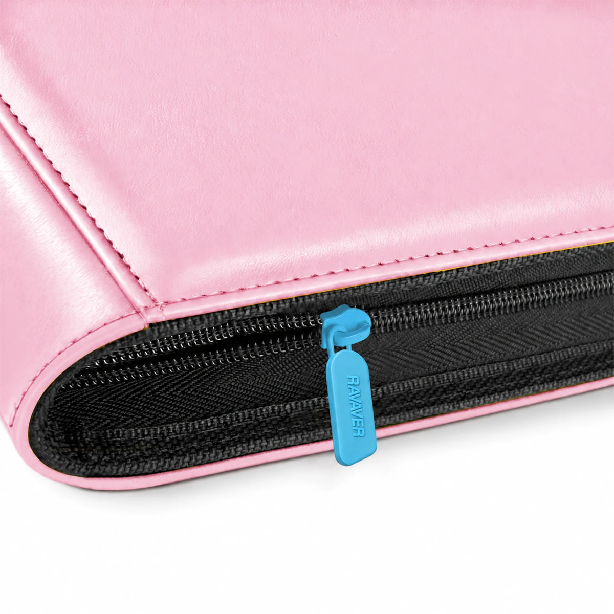 Close-up of the sky-blue zipper pull, black zipper, and pink edge stitching on a Mew toploader binder
