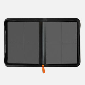 Interior view of an orange 4-pocket Pokemon card binder with empty black side-loading pages and 160-card capacity