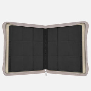 Interior view of white Pokemon toploader binder with empty 9-pocket pages and 252-card capacity