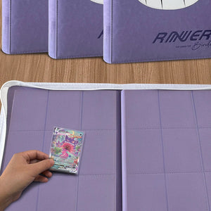 Hand placing holographic Pokemon card into 9-pocket binder beside three purple Gengar binders
