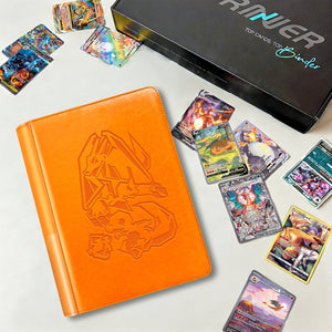 Orange 4-pocket Pokemon card binder displayed beside scattered Charizard holographic cards and a premium gift box