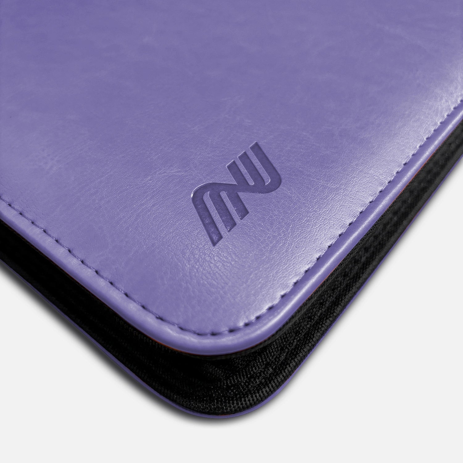 Close-up of embossed logo on purple leather Pokemon toploader binder corner with stitching